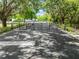 Marina entrance with gated access and lush landscaping at 1810 Lee Janzen Dr, Kissimmee, FL 34744