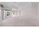 Spacious main bedroom with sitting area has lots of natural light and a view of the pool at 1810 Lee Janzen Dr, Kissimmee, FL 34744