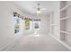 Sitting area features built in shelving and pool views from the three windows at 1810 Lee Janzen Dr, Kissimmee, FL 34744
