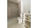 Bathroom showcasing an updated walk-in shower and modern vanity at 2221 Wakulla Way, Orlando, FL 32839