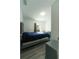 Comfortable bedroom features gray flooring, natural light, and ample closet space, offering a serene ambiance at 2221 Wakulla Way, Orlando, FL 32839