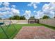 Backyard with well-maintained lawn, brick patio, and gazebo with dining set, perfect for outdoor entertaining and Gathering fun at 2740 Picasso Ct, Kissimmee, FL 34743