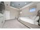 Spacious bedroom with carpet flooring, a tray ceiling and large windows with beautiful curtains at 2740 Picasso Ct, Kissimmee, FL 34743