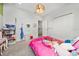 Charming ' bedroom featuring playful decor and a cozy atmosphere at 2740 Picasso Ct, Kissimmee, FL 34743