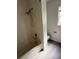 Neutral bathroom featuring tiled shower with combined tub at 2833 Falling Tree Cir, Orlando, FL 32837