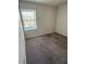 Cozy bedroom with neutral carpet and natural light at 2833 Falling Tree Cir, Orlando, FL 32837