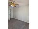 This bedroom offers neutral carpeting and bright natural light at 2833 Falling Tree Cir, Orlando, FL 32837
