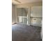 Open loft space with neutral carpeting overlooking lower level at 2833 Falling Tree Cir, Orlando, FL 32837