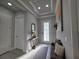 Elegant foyer with tray ceiling, recessed lighting, and entry door at 2853 Willowseed Ln, St Cloud, FL 34772