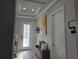 The foyer includes a tray ceiling, recessed lighting, and a front door with sidelights at 2853 Willowseed Ln, St Cloud, FL 34772