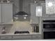 Modern kitchen featuring stainless steel appliances, a quartz countertop, and white herringbone backsplash at 2853 Willowseed Ln, St Cloud, FL 34772