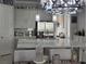 Bright kitchen featuring stainless steel appliances, a large island, and modern pendant lighting at 2853 Willowseed Ln, St Cloud, FL 34772