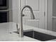 Close up on kitchen island sink with a gooseneck faucet and white countertop at 2853 Willowseed Ln, St Cloud, FL 34772