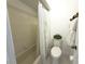 Bathroom featuring a shower and a toilet at 3006 S Semoran Blvd # H-3, Orlando, FL 32822