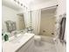 Bathroom featuring a quartz vanity, shower and toilet at 3006 S Semoran Blvd # H-3, Orlando, FL 32822