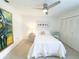 Bedroom featuring a large closet, tile flooring and ceiling fan at 3006 S Semoran Blvd # H-3, Orlando, FL 32822