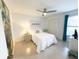 Bedroom featuring a large closet, tile flooring and ceiling fan at 3006 S Semoran Blvd # H-3, Orlando, FL 32822
