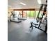 Well-equipped gym with treadmills and weight machines for a complete workout at 3006 S Semoran Blvd # H-3, Orlando, FL 32822