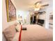 Comfortable main bedroom features neutral tones and ensuite bathroom at 3006 S Semoran Blvd # H-3, Orlando, FL 32822