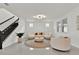 Elegant living room with modern furniture, neutral tones, and plenty of natural light at 3026 Prospect Trl, St Cloud, FL 34771