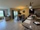 Bright open concept, great flow between living area and dining, with a modern kitchen in view at 306 Briar Patch Loop, Davenport, FL 33896