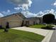 Lovely single story home with a large driveway in a quiet neighborhood at 306 Briar Patch Loop, Davenport, FL 33896