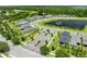 An aerial view showing the community entrance, surrounded by lakes and trees, creating a serene setting at 3204 Oxbow Ct, St Cloud, FL 34773