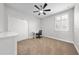 Bedroom features neutral carpet, ceiling fan, desk, and closet at 3204 Oxbow Ct, St Cloud, FL 34773