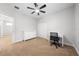 Bedroom featuring neutral carpet, ceiling fan, a white dresser, closet and desk at 3204 Oxbow Ct, St Cloud, FL 34773