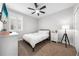 Bedroom with carpet floors, neutral paint, ceiling fan, and lots of natural light at 3204 Oxbow Ct, St Cloud, FL 34773