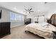 Spacious main bedroom with plantation shutters, ensuite bathroom, carpet, and lots of natural light at 3204 Oxbow Ct, St Cloud, FL 34773