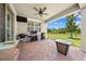Outdoor patio with ceiling fan, grill, outdoor furniture, and view of fenced yard at 3204 Oxbow Ct, St Cloud, FL 34773