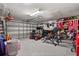 Spacious garage with ample storage, a workspace, and plenty of room for vehicles and projects at 3217 Whooping Crane Run, Kissimmee, FL 34741