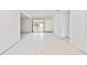 Bright and airy living room featuring tile flooring and a view of the backyard at 441 Kentia Rd, Casselberry, FL 32707