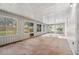 Large, airy sunroom with many windows letting in natural light at 4805 Jay Dr, St Cloud, FL 34772