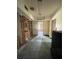 Unfinished interior with exposed studs, showing an open concept space ready for customization at 4950 Silver Star Rd, Orlando, FL 32808