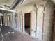 Commercial space ready for renovations, showcasing exposed block walls, open doorways, and ductwork at 4950 Silver Star Rd, Orlando, FL 32808