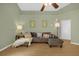Spacious living room with vaulted ceilings, comfortable seating, and large windows at 608 Wechsler Cir, Orlando, FL 32824