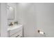 Modern powder room with a vessel sink, gold fixtures, and a mirror at 7043 Carlene Dr, Orlando, FL 32835