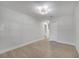 Bedroom with closet and modern floors at 7043 Carlene Dr, Orlando, FL 32835