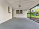 Carport featuring concrete flooring and white-painted block walls at 7043 Carlene Dr, Orlando, FL 32835