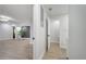 Hallway showing access to a renovated bathroom and the view of the living area at 7043 Carlene Dr, Orlando, FL 32835