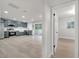 Open concept kitchen and living area with modern appliances and ample space at 7043 Carlene Dr, Orlando, FL 32835