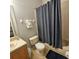 Neutral bathroom with tiled shower and tub combination, providing a clean and functional space at 746 Terra Lago St, Davenport, FL 33897