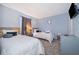 Serene bedroom featuring twin beds, soft lighting, and minimalist decor creating a calming and restful atmosphere at 746 Terra Lago St, Davenport, FL 33897