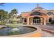 Exterior view of building Regal Palms Bar Restaurant and Spa with a beautiful water fountain at 746 Terra Lago St, Davenport, FL 33897