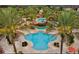 Aerial view of a large, well-maintained community pool surrounded by lush landscaping at 746 Terra Lago St, Davenport, FL 33897