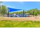 Community playground featuring modern play equipment and a shaded area for children to enjoy at 7621 Sutherton Ln, Windermere, FL 34786