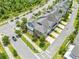 Aerial view of homes with lush greenery at 9121 Laureate Blvd, Orlando, FL 32827