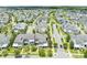 Expansive aerial view of the neighborhood, showcasing the home's prime location within a vibrant community at 9121 Laureate Blvd, Orlando, FL 32827